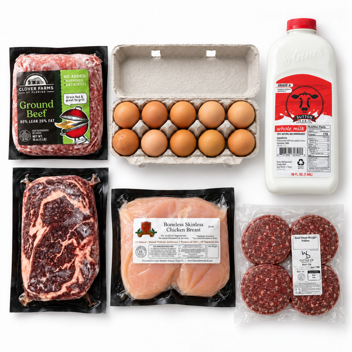 A flat-lay arrangement of grocery items on a white background: a package of Clover Farms Ground Beef, a carton of brown eggs, a whole milk jug labeled Cream, a raw beef steak, a package of Boneless Skinless Chicken Breast, and a package of beef patties.